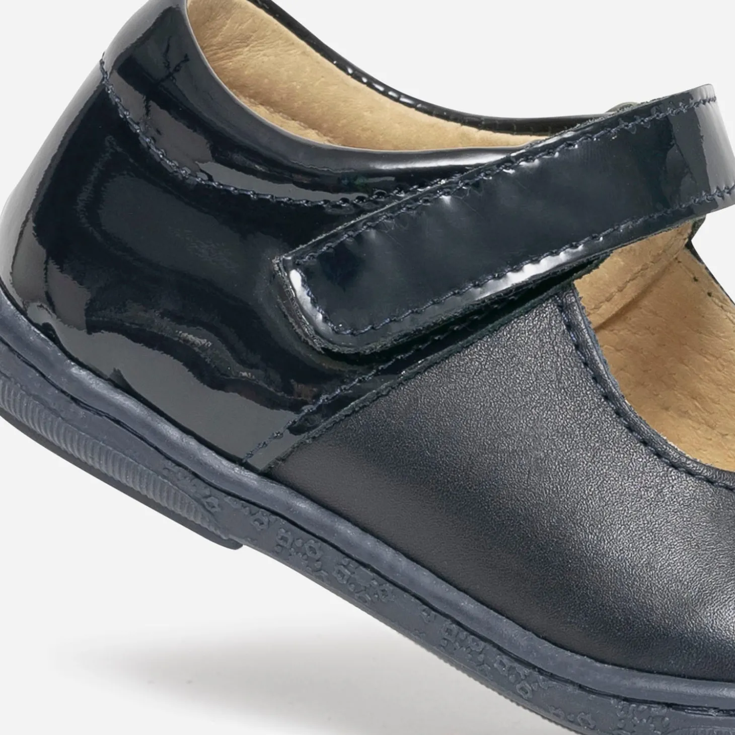 Babies bleu marine en cuir et verni