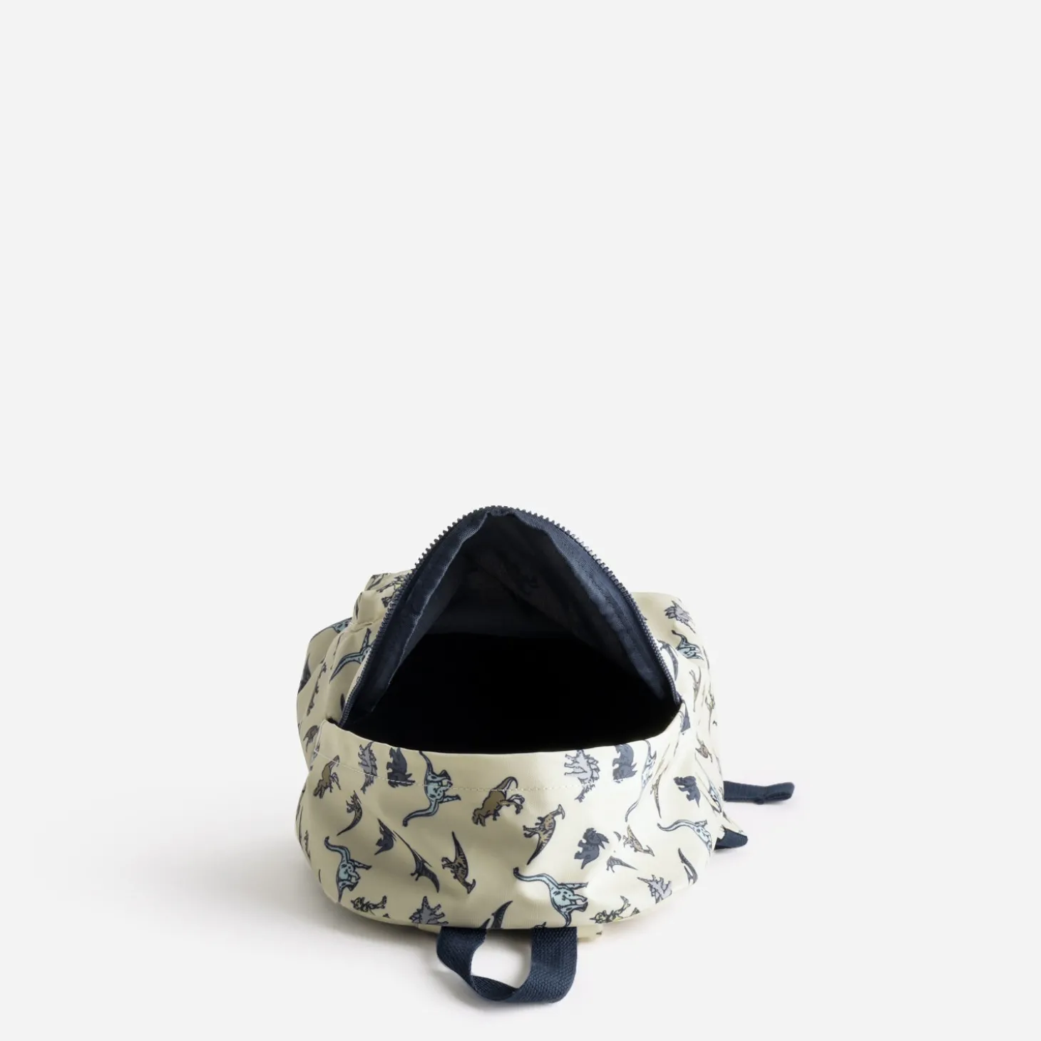 Sac à dos beige motifs dinosaures